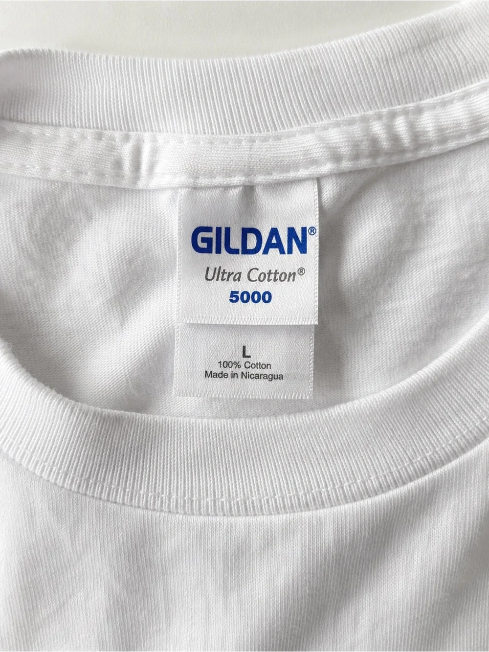 Gildan 5000 White Short-Sleeve Tee with Red Graphic Text and Eyes Vintage Size L